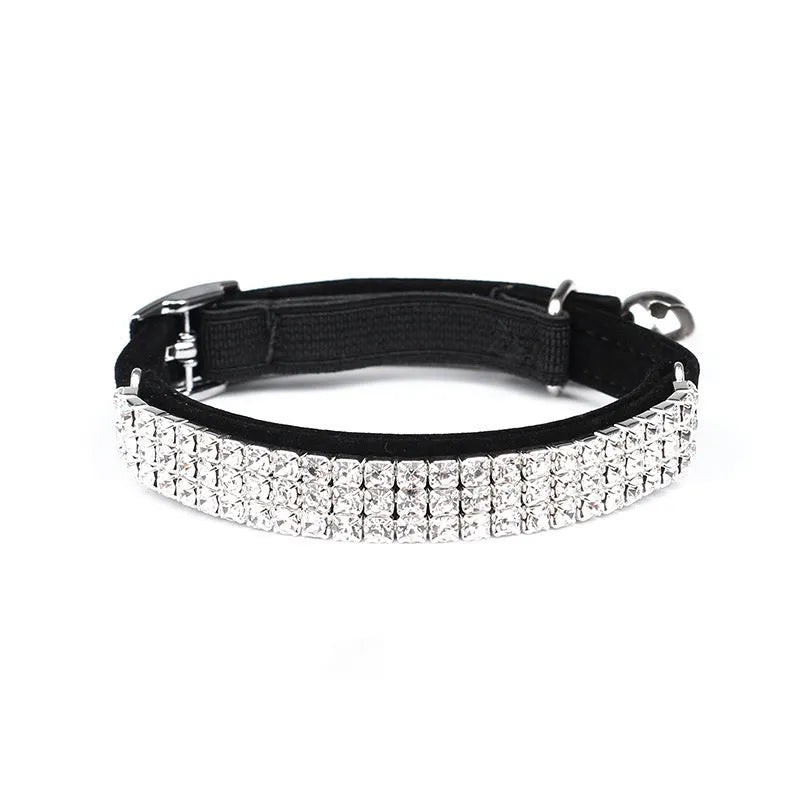 Velvet cat collar with rhinestones in red, blue, purple, black, or pink, showing adjustable buckle.