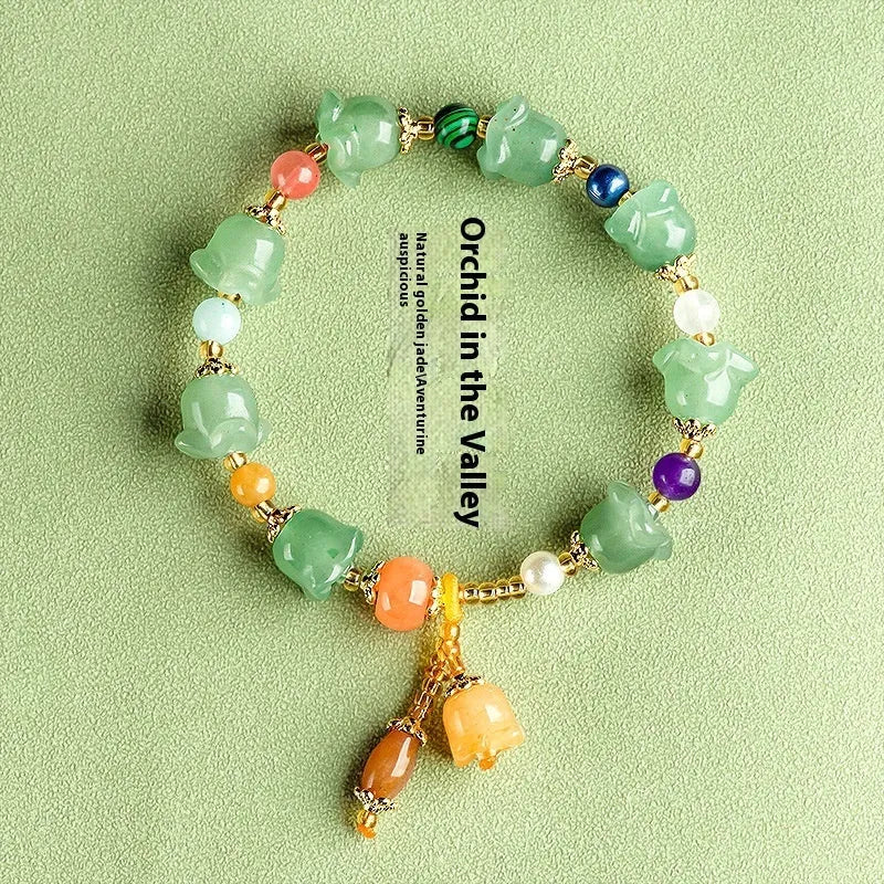 Women's natural jade orchid bracelet with carved beads for 14-18cm wrist.