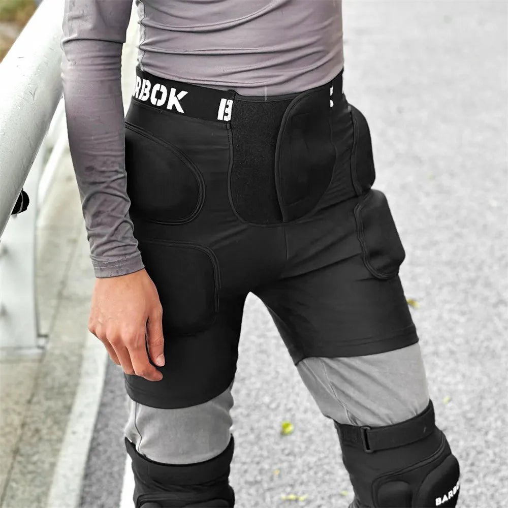 Black adult roller skating hip protection shorts with integrated NBR foam armour panels.