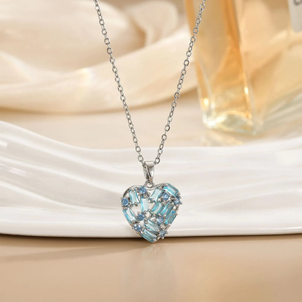 Copper heart pendant necklace with zircon accent on O-ring chain, electroplated finish, gold blue colour option