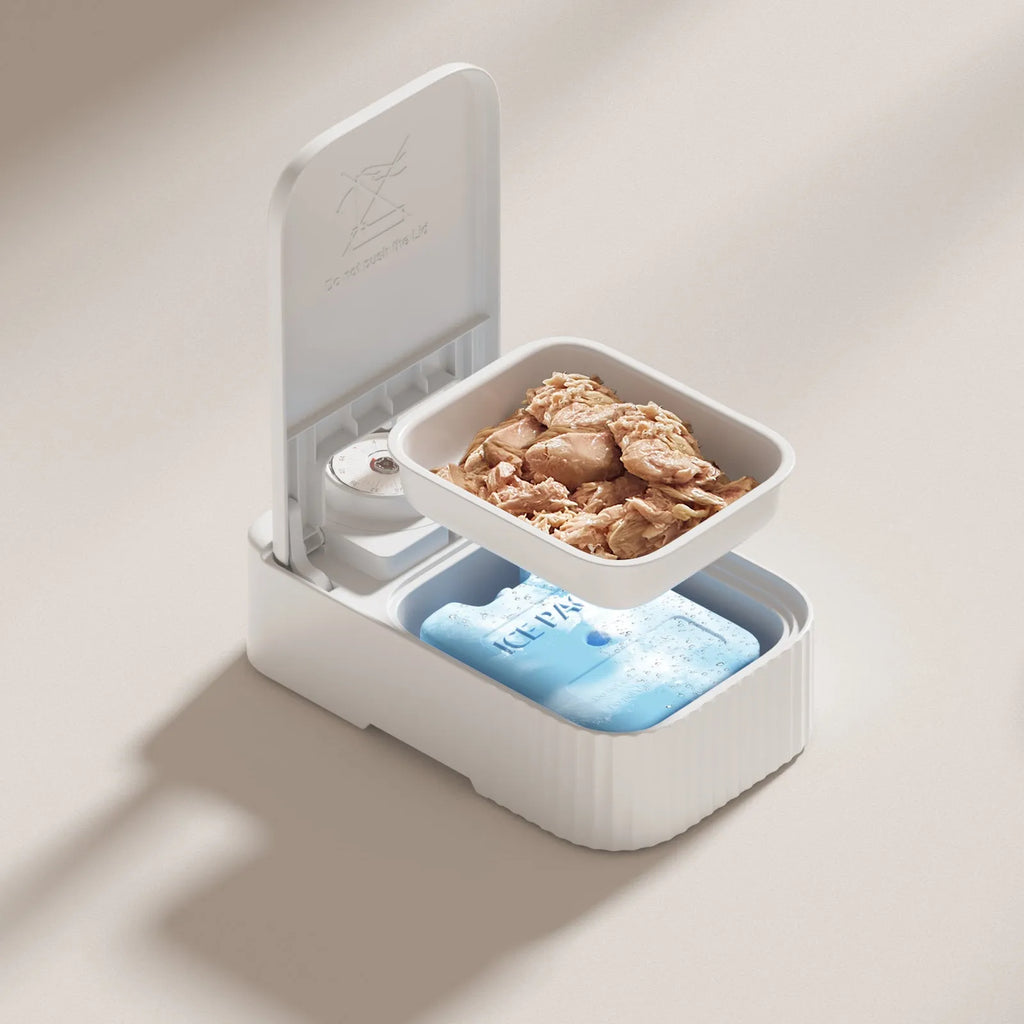 White automatic pet feeder with timer display and removable ice crystal cooling box underneath.