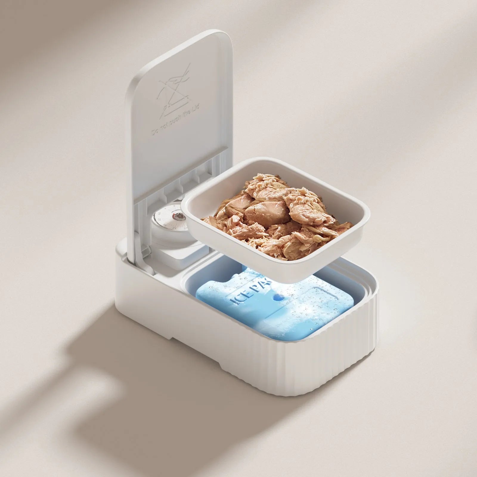 White automatic pet feeder with timer display and removable ice crystal cooling box underneath.