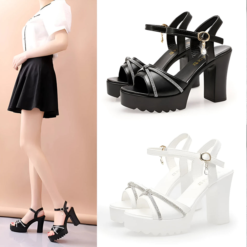 Women's black and white high heel sandals made from PU, available in sizes 35 to 42 UK.
