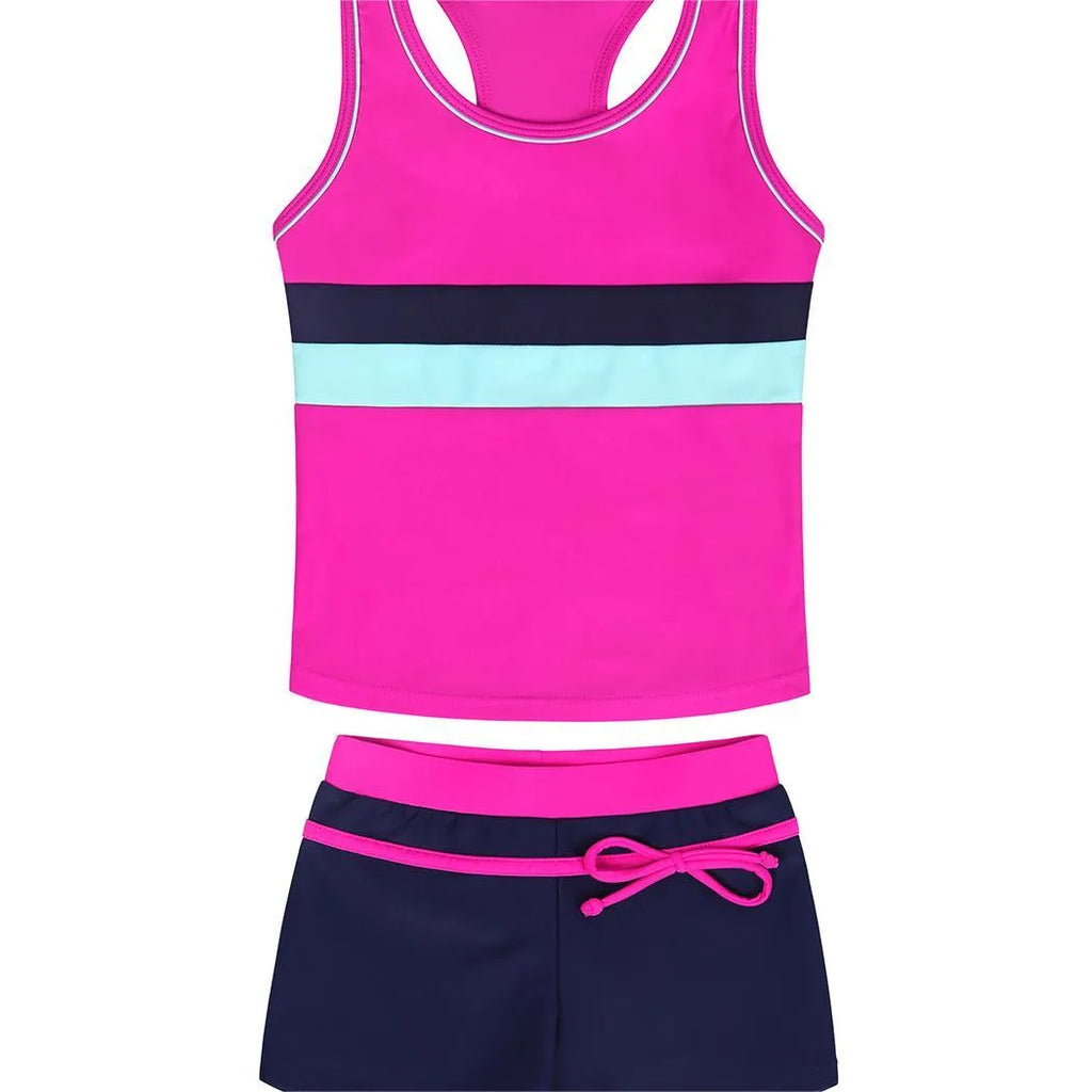 Girls two-piece split boxer swimsuit with chest pad in blue showing shirt and shorts on child model