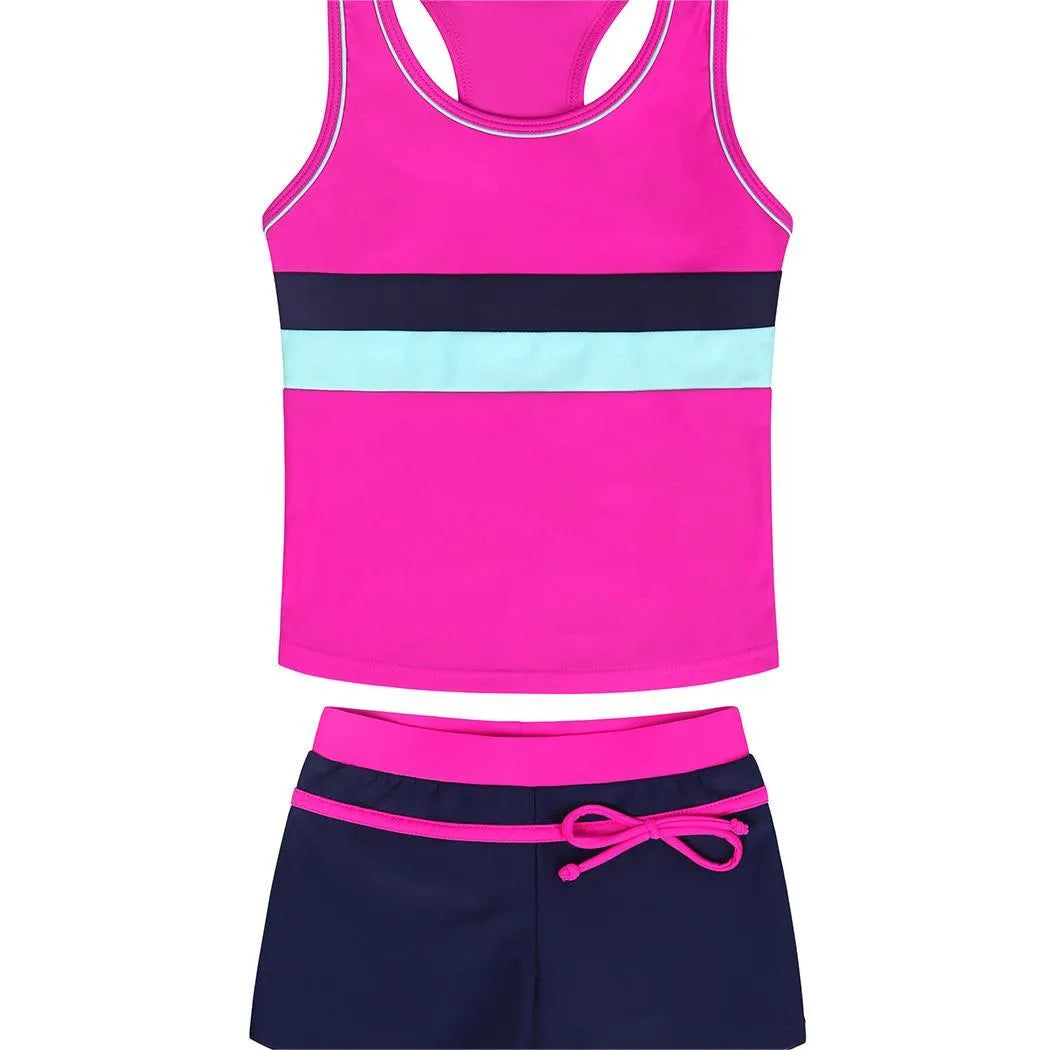 Girls two-piece split boxer swimsuit with chest pad in blue showing shirt and shorts on child model