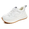 Women's white low-top leather casual shoes with cross strap and English muffin heel