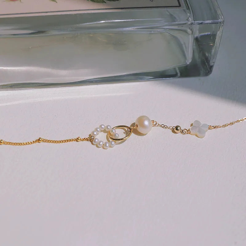 Natural pearl women's bracelet with 14k gold-plated accents in picture colour