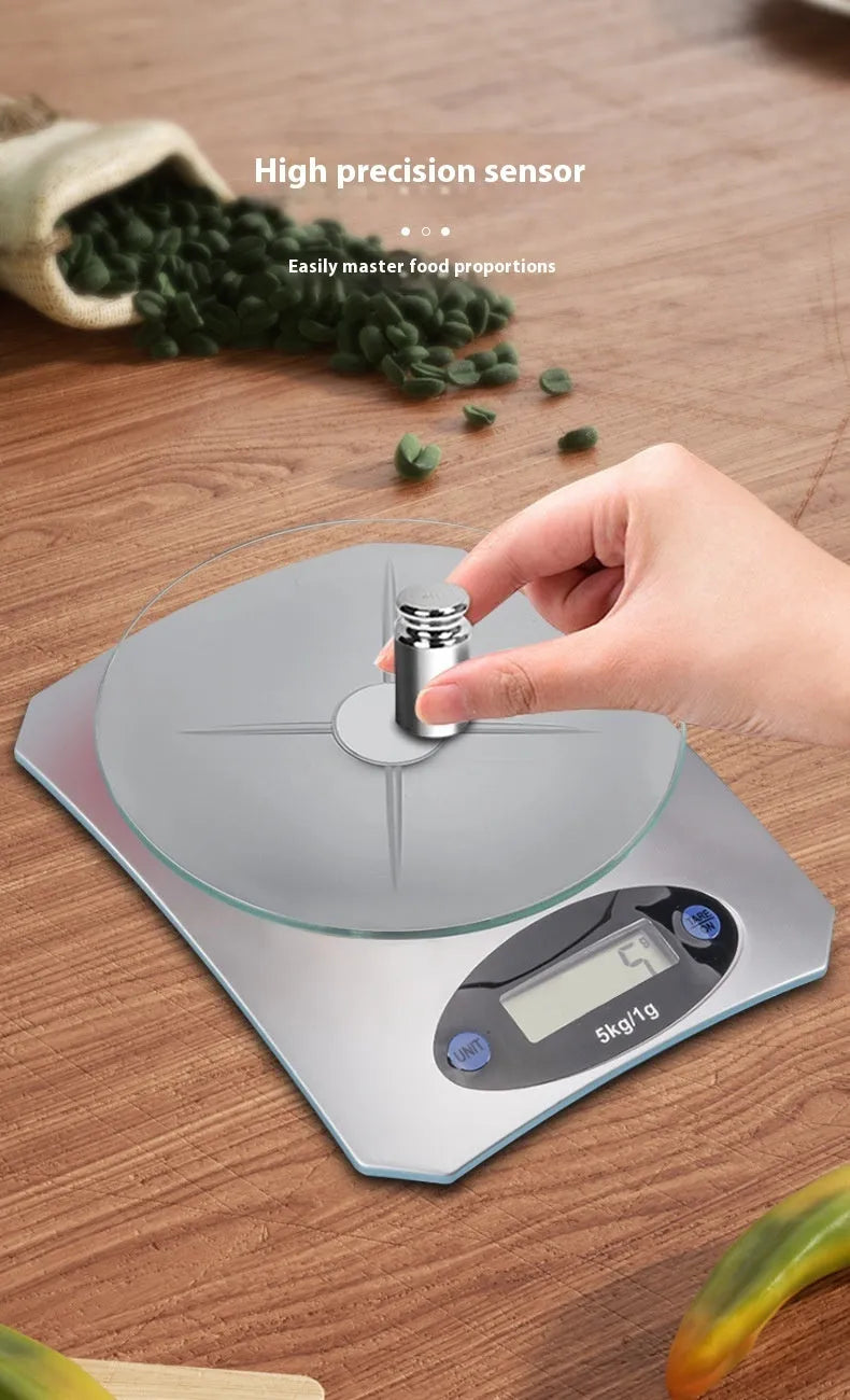 Silver white mini kitchen electronic scale, battery-powered, simple compact design for weighing