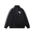 Man wearing a black American retro stand collar long sleeve hoodie coat.