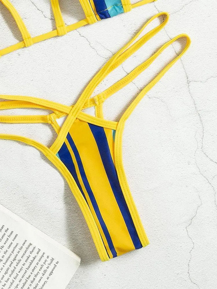 Yellow women's high-waisted split swimsuit with backless hollow design and quick-dry polyester fabric