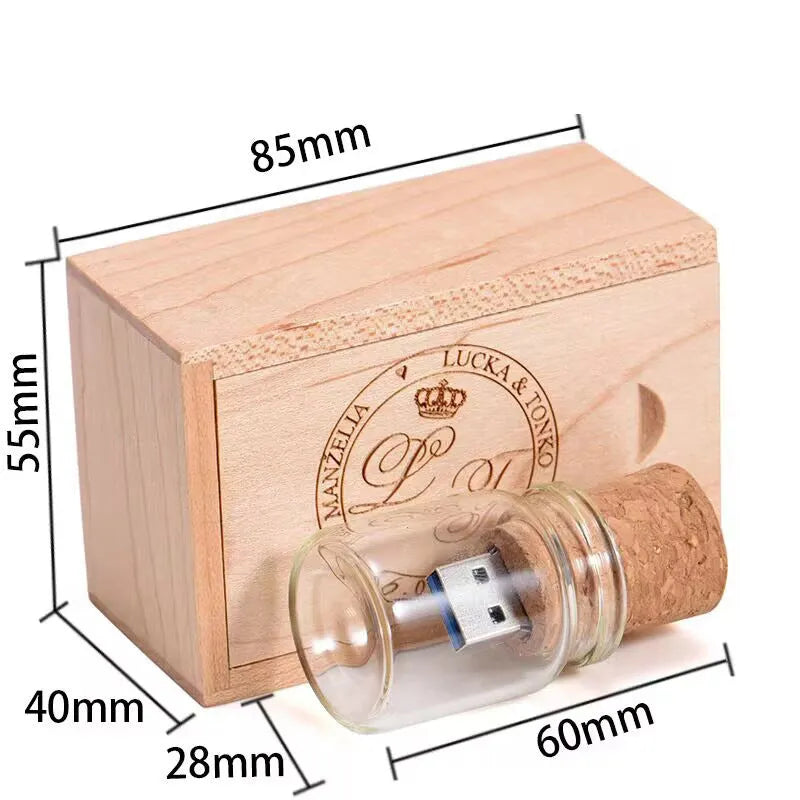 Transparent bottle-shaped USB flash drive with a wooden charm inside, showing metal connector.