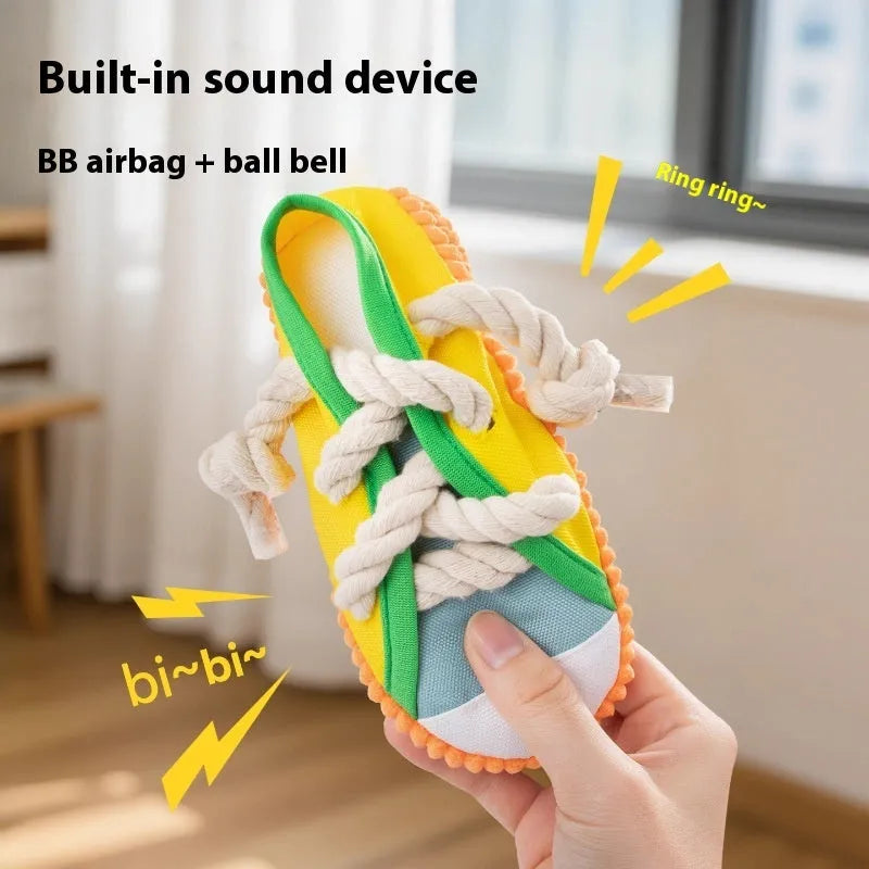 Plastic dog chew toy in yellow, black, or blue with a contoured shape for biting.