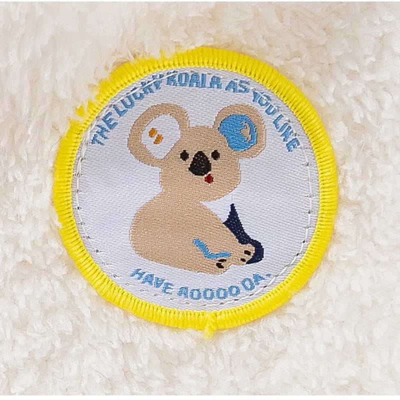 Yellow two-legged fleece pet coat with koala patch for small dogs and cats, sizes XS to XXL.