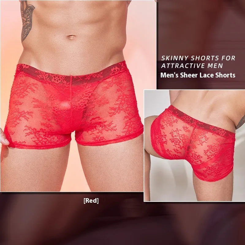 Fashion Personality men's black boxers with a white lace trim detail laid flat.