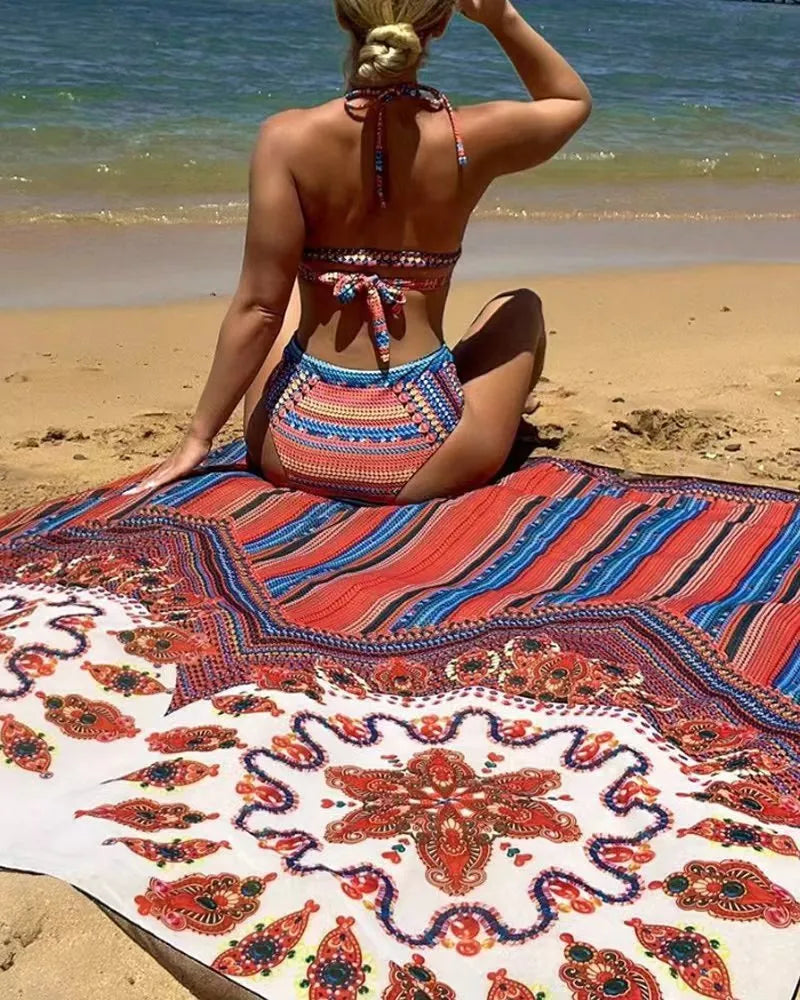 Women's three-piece swimsuit set showing split-front blouse, high-waist briefs, and longline cover-up coat on a model.