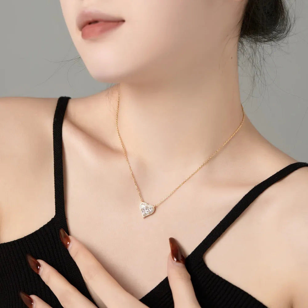 925 silver heart-shaped pendant necklace with cubic zirconia stone on white background
