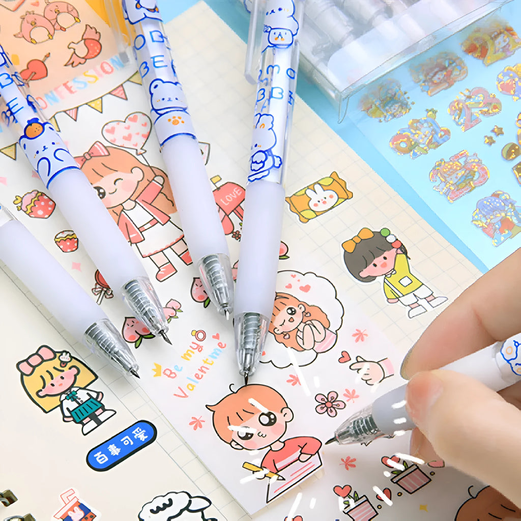 Set of six cute character-themed press pen knives including bear and rabbit designs.