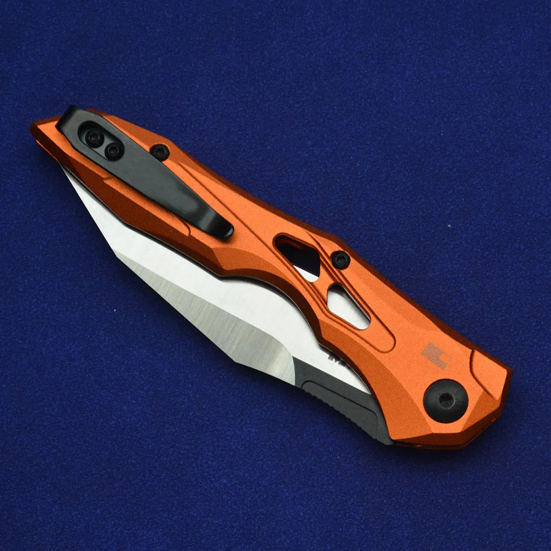 Black folding fruit knife with D2 steel blade and aluminium handle showing open and closed positions