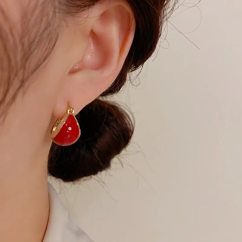 Pair of retro copper earrings with micro-inlaid drip oil design and thick real gold plating in geometric shape