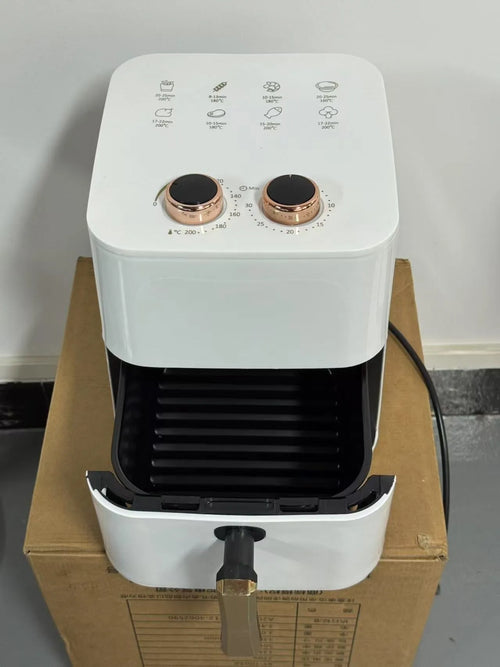 Black digital air fryer with touch screen and 5.5L basket on kitchen countertop