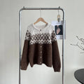 Women's beige jacquard patterned thick knit sweater coat with a loose fit and long sleeves.
