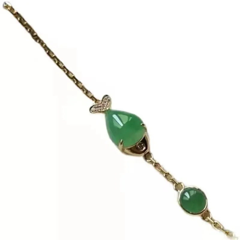 Copper retro-style bracelet with a yellow gold electroplated finish on a wrist.