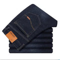 Men's slim straight leg jeans in black cotton denim with mid waist and zip fly, sizes 28-40.