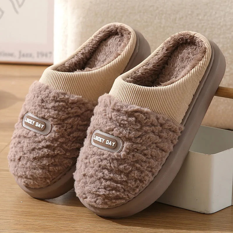 Men's grey and brown plaid pattern cotton slippers with rabbit hair trim and a thick EVA sole.