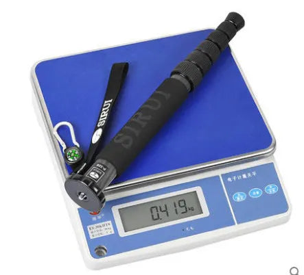 Black carbon fibre SLR camera monopod collapsed to 380mm with six telescopic sections