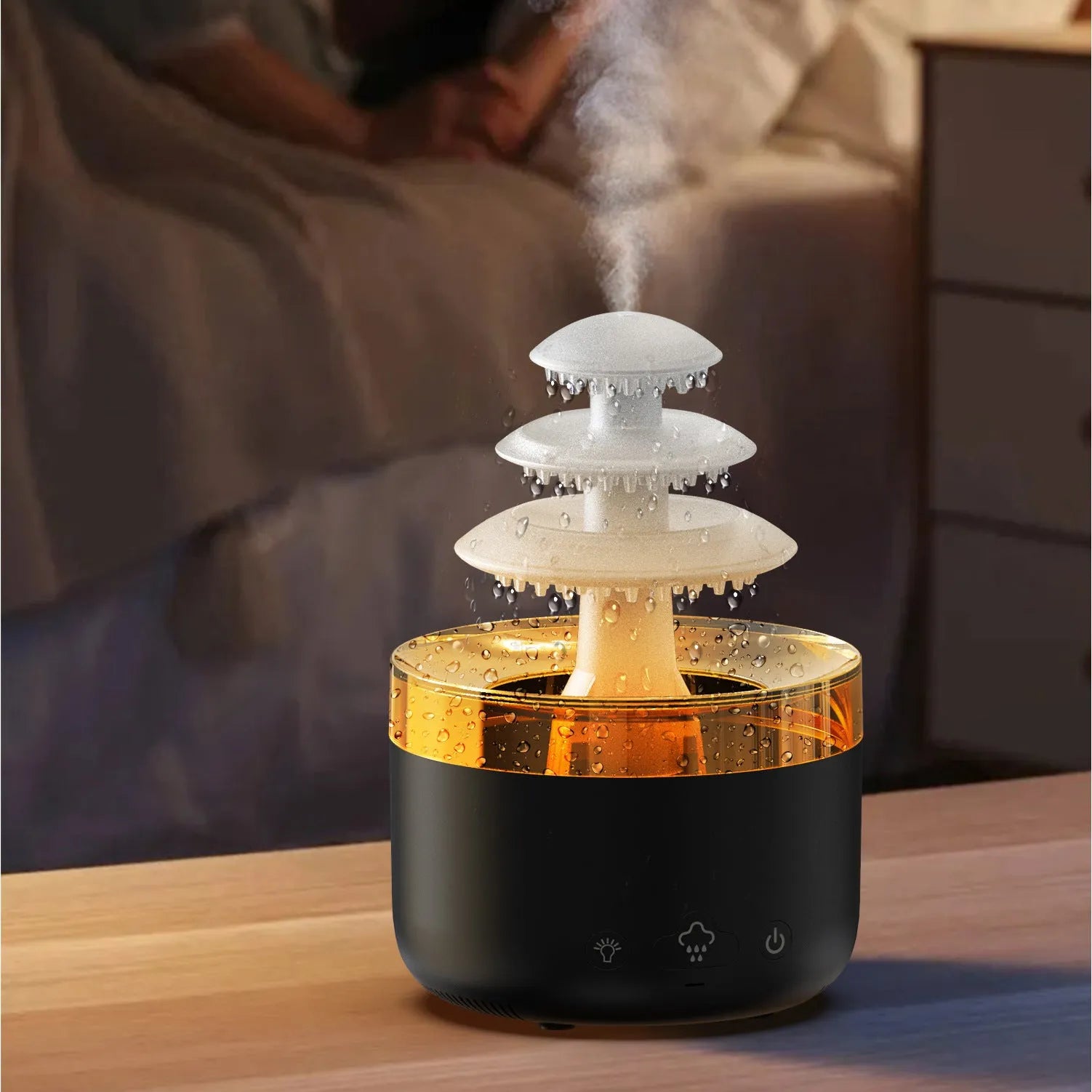 White cloud-shaped USB humidifier and essential oil diffuser with LED lights on a table