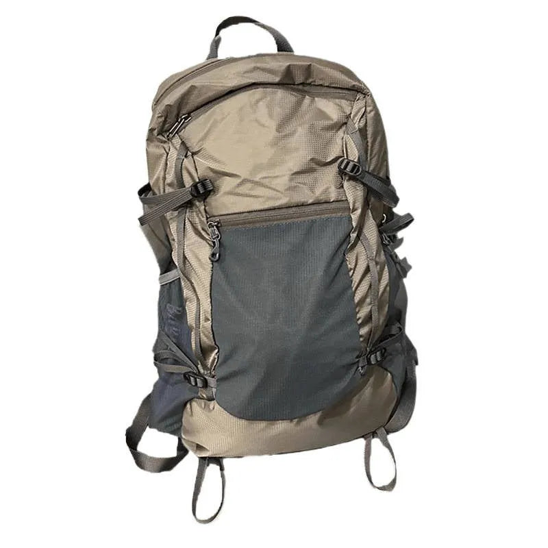 Lightweight waterproof nylon backpack 20-35L in natural Renaissance khaki light with curved shoulder straps and contrast colour detail