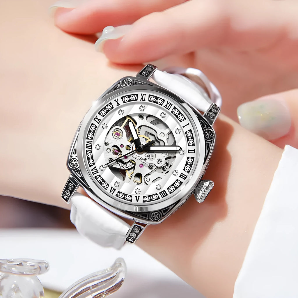 Men's black mechanical watch with luminous hands on a leather strap, showing water resistance.