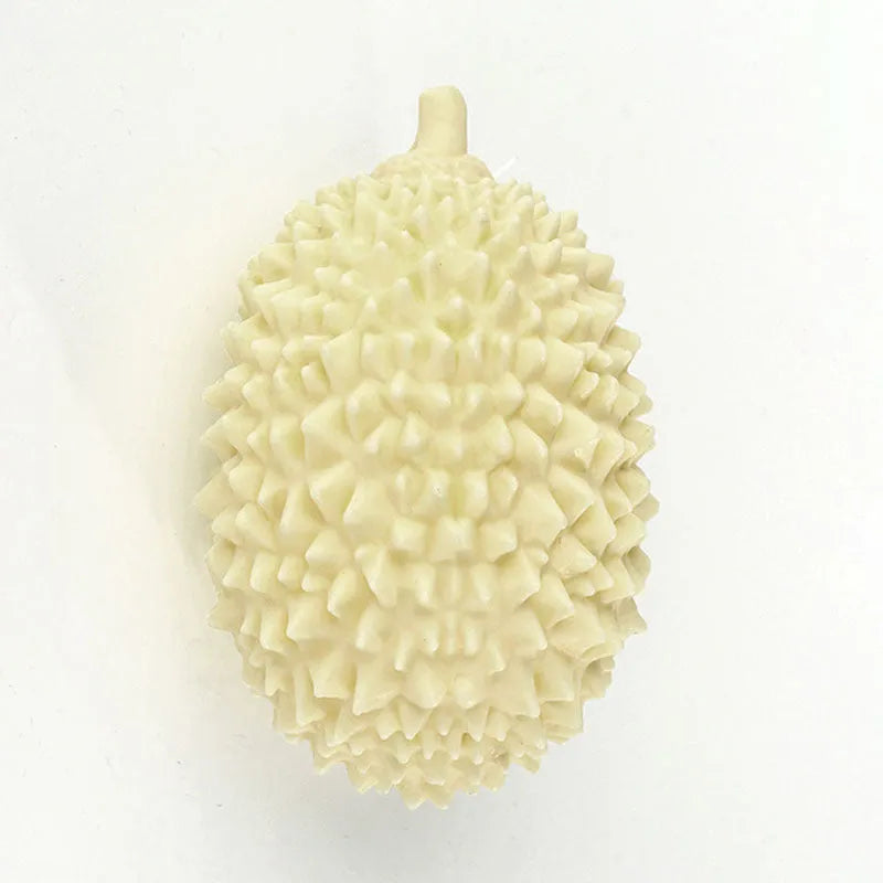 Beige, green and yellow durian-shaped dog chew toy with raised texture for dental cleaning