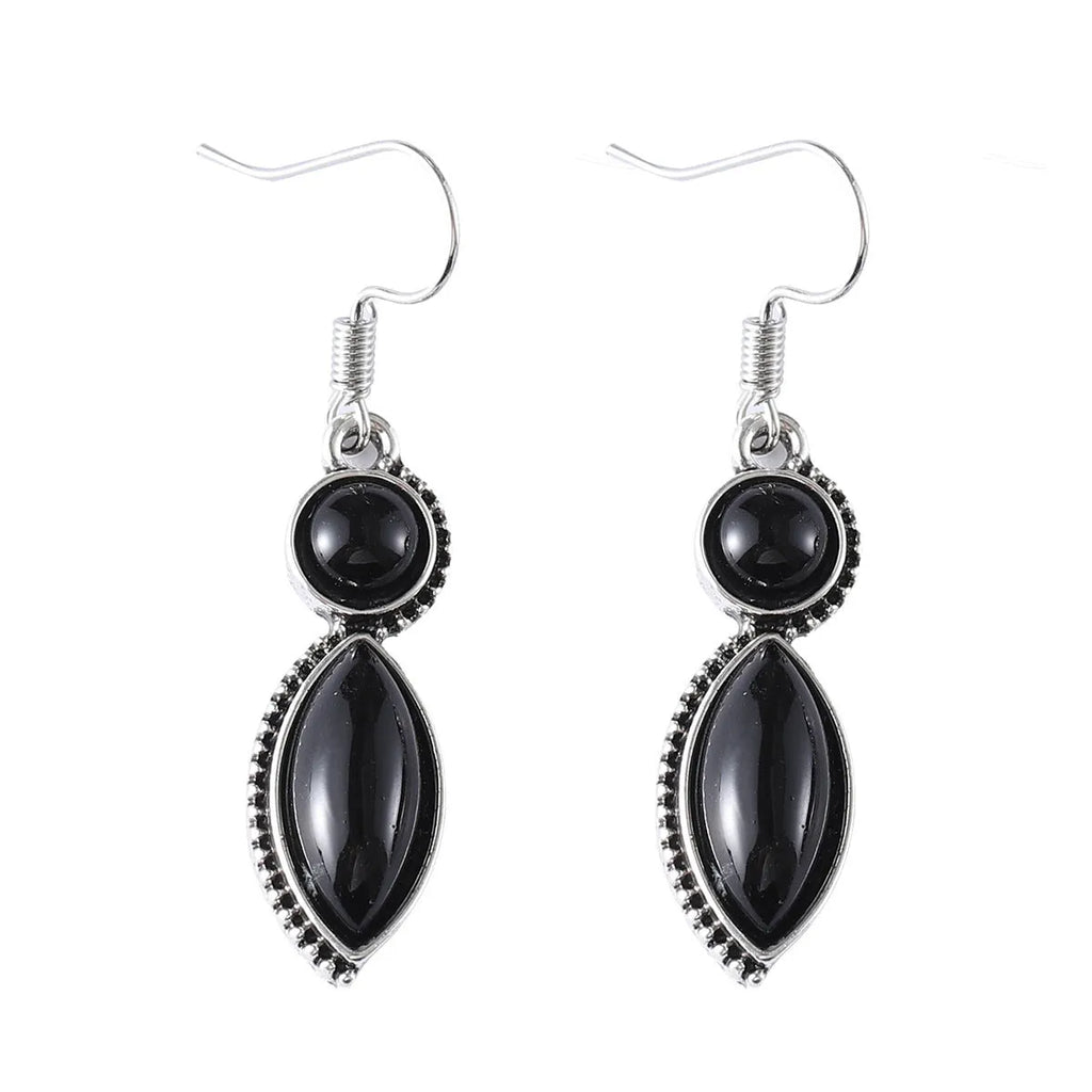 A pair of vintage-style geometric pendant earrings with purple and black stones on a zinc alloy frame.