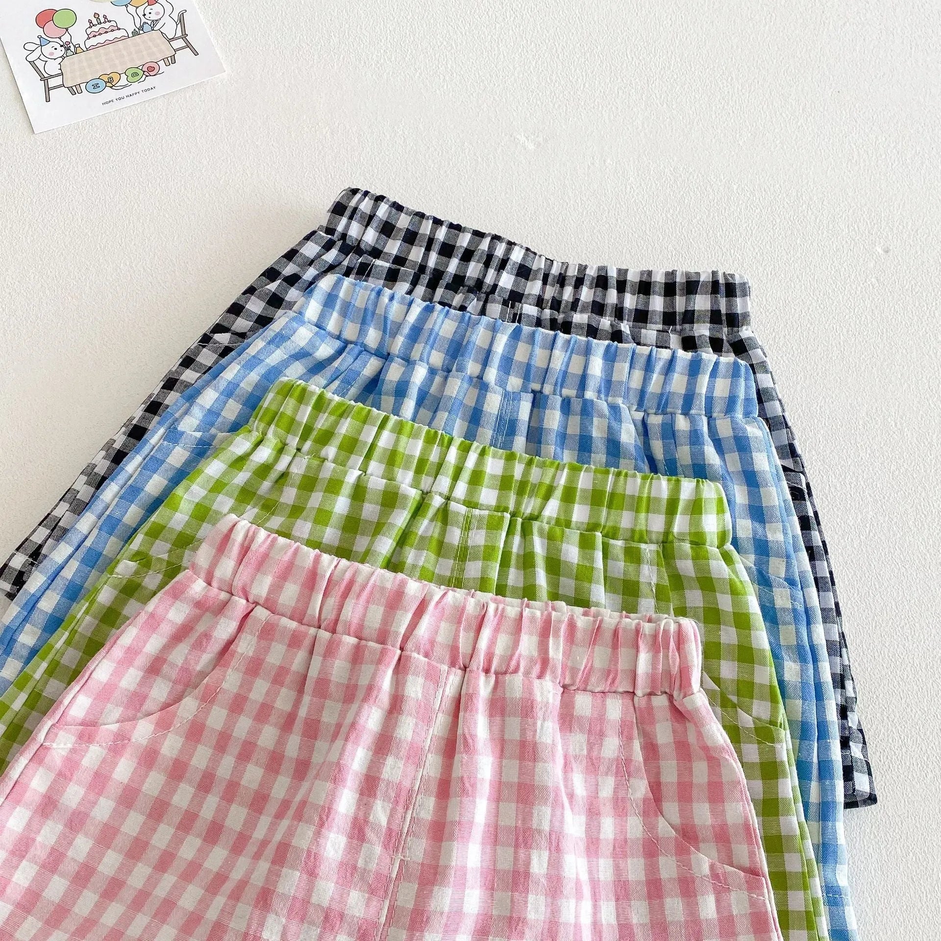Girls' cotton cartoon T-shirt and plaid shorts two-piece set in avocado green and peach