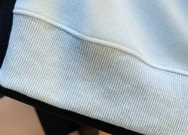 Women's fake two-piece sleeveless sweater top with tie polo collar and plush fabric, blue or gray, cropped length.