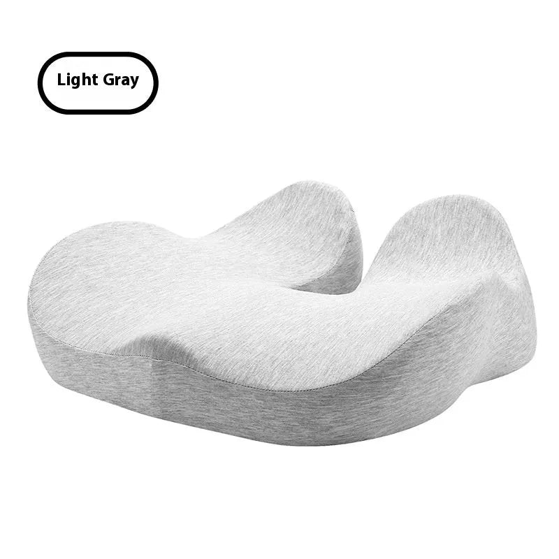 Light grey memory foam office chair cushion on a desk chair.