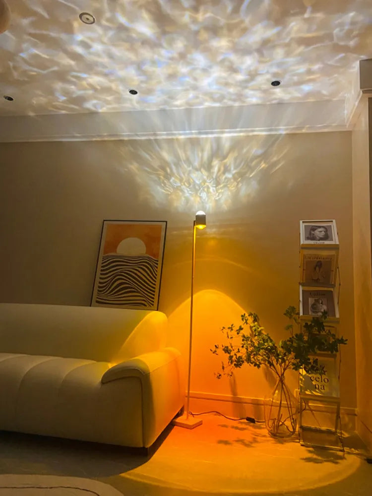 Modern Sunset Red floor lamp projecting a water wave light pattern onto a floor.