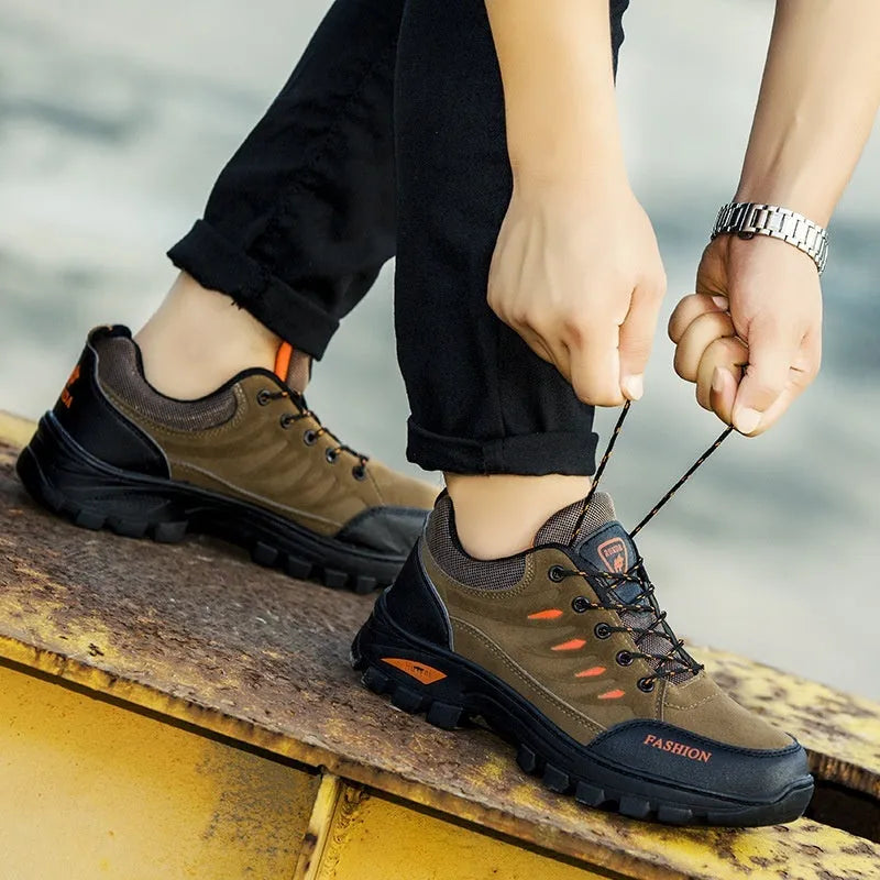 Men's brown suede hiking sneakers with rubber soles and lace-up design