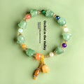Women's natural jade orchid bracelet with carved beads for 14-18cm wrist.