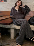 Two-piece sweatshirt and wide leg pants set in stripes or plaid pattern, conventional sleeves, sizes L to 4XL