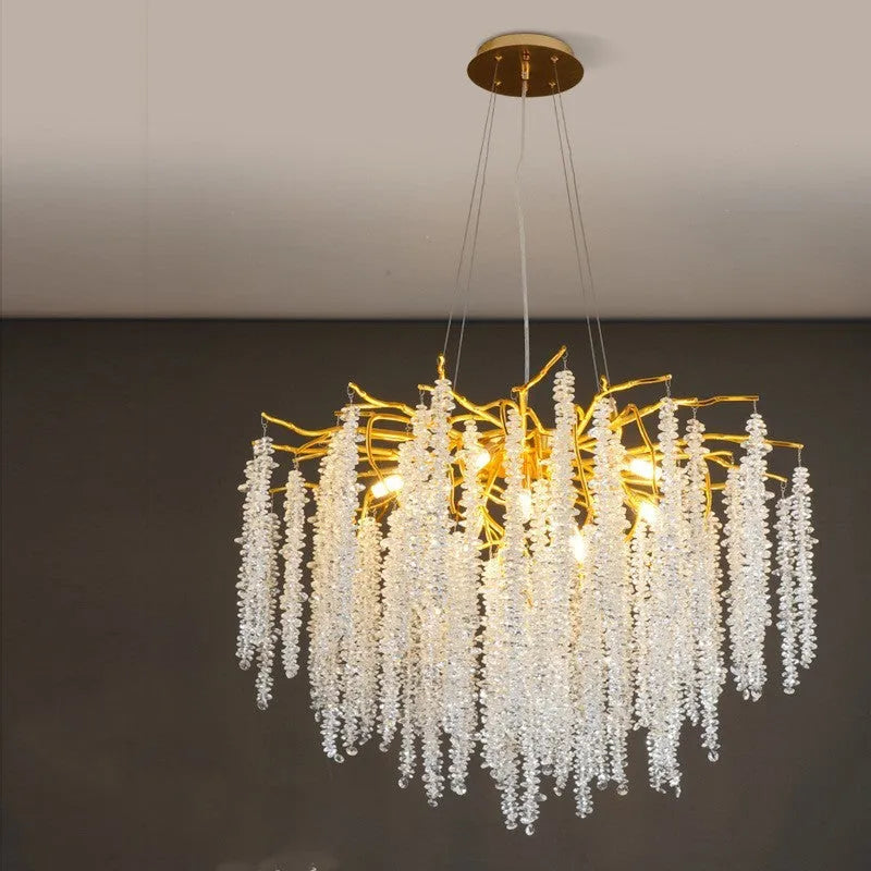 Modern crystal chandelier light fitting with adjustable height in round and long style options.