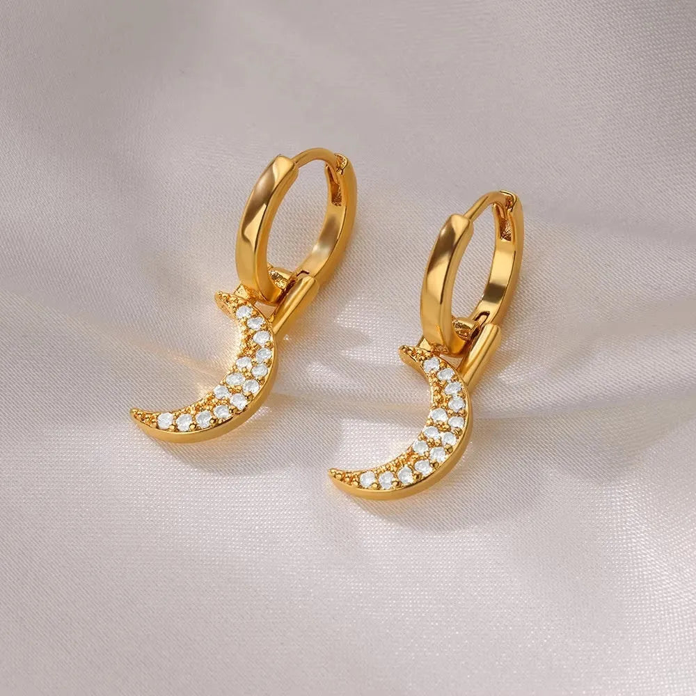 Women's copper butterfly earrings with heart, bow, and star geometric shapes in multiple colours.