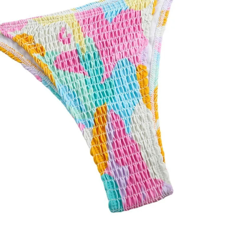 Multicolour floral printed women's triangle bikini with smocking craft details on the fabric.