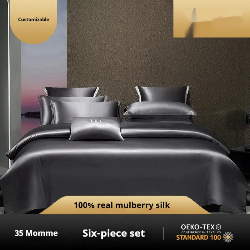 Household Fashion silk quilt cover set in Champagne Gold colour, showing quilt cover and pillowcases on a bed.