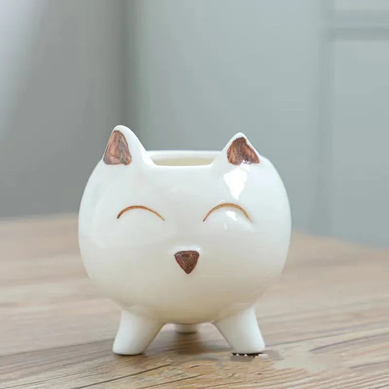 Ceramic succulent flowerpot with hand-painted cartoon animal design in pastel colours
