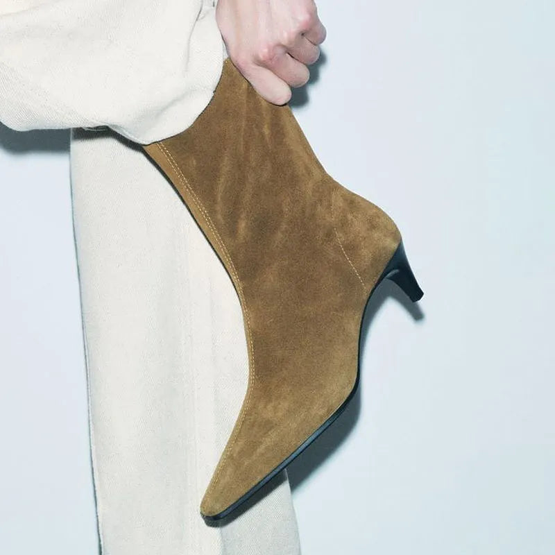 Brown square-toe mid-calf boots with a side zip and a stiletto kitten heel on a plain background.