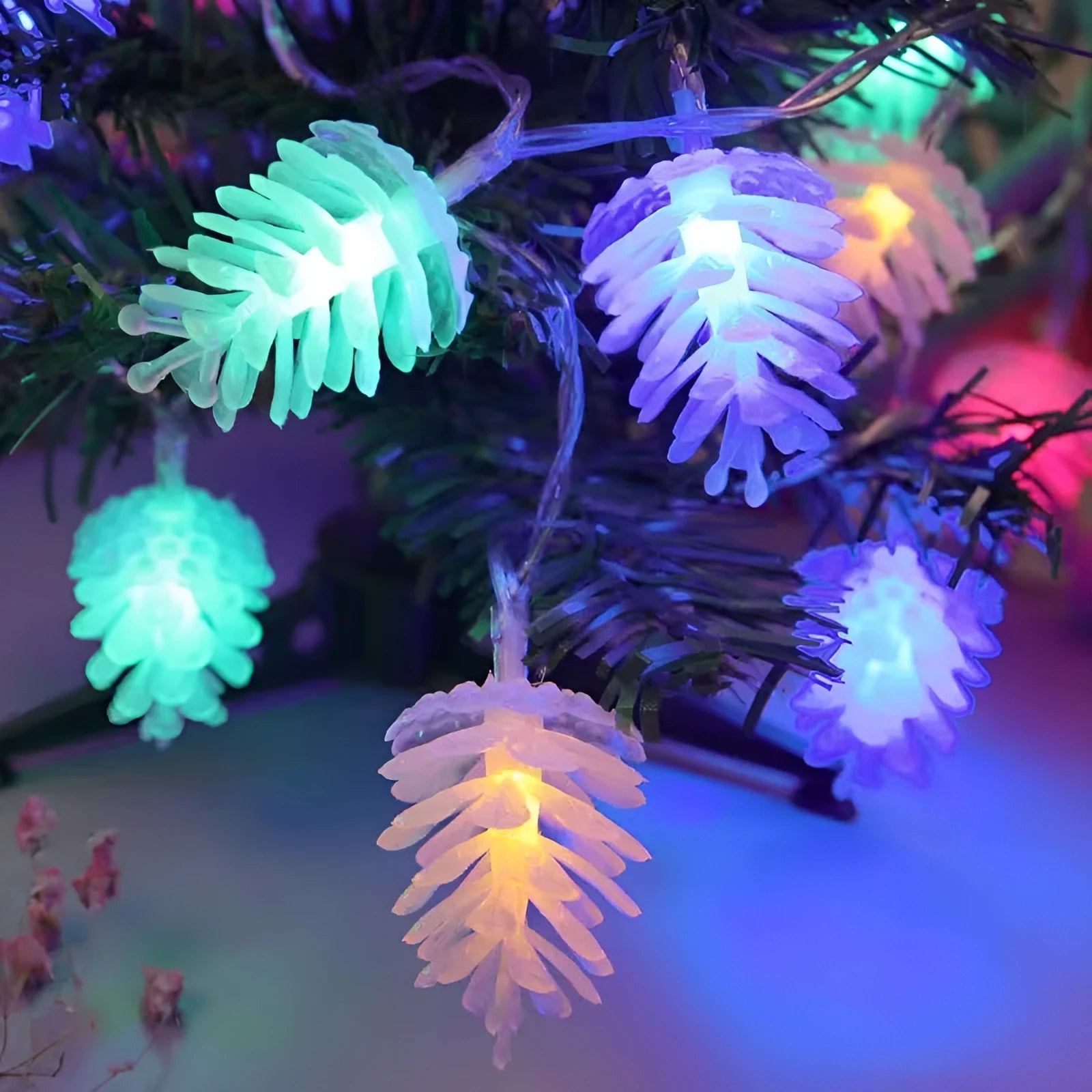 LED simulation transparent pine nut light string with PVC coating, showing multiple bulbs on a dark background