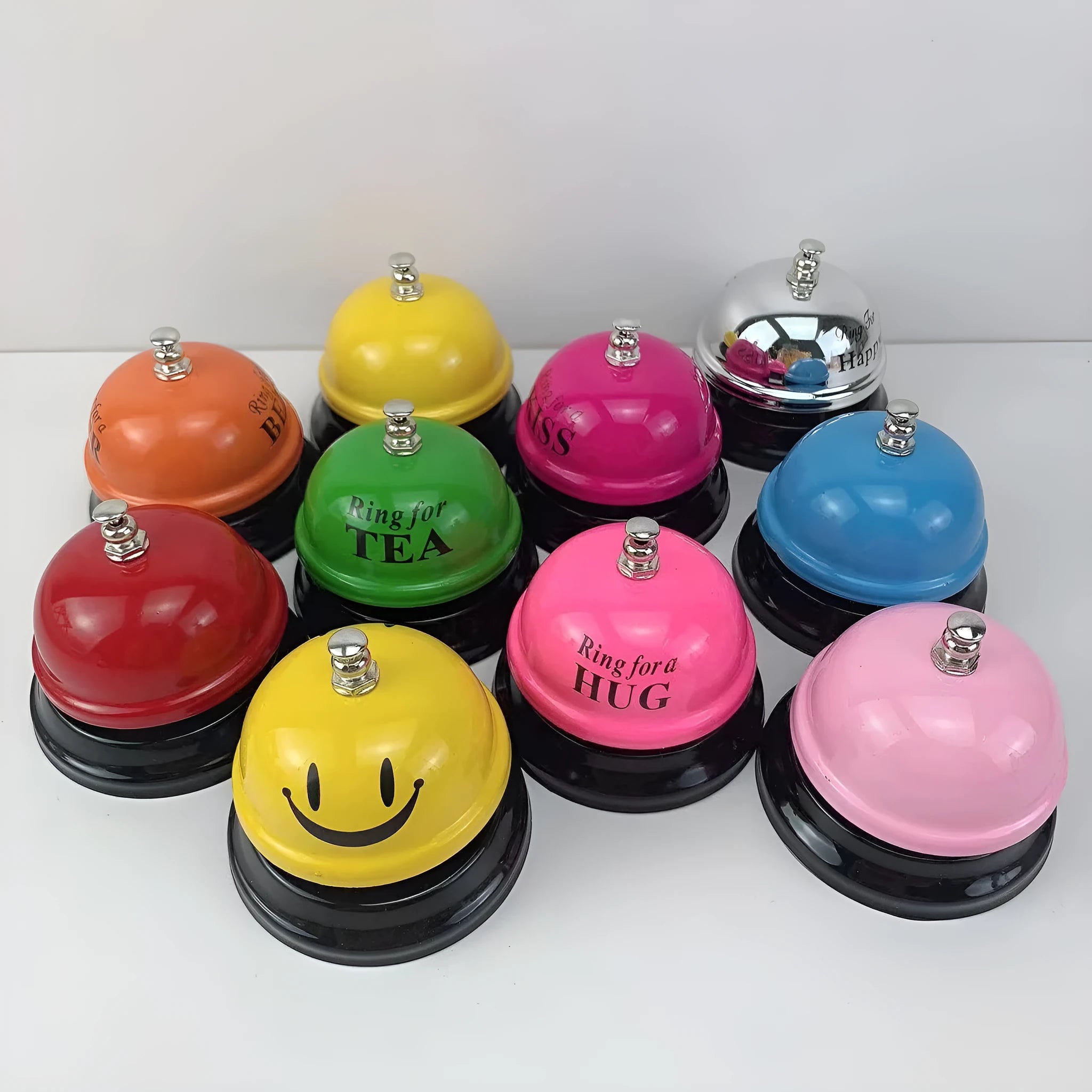 Iron classroom game bell in one of ten colours: blue, green, pink, red, or yellow.