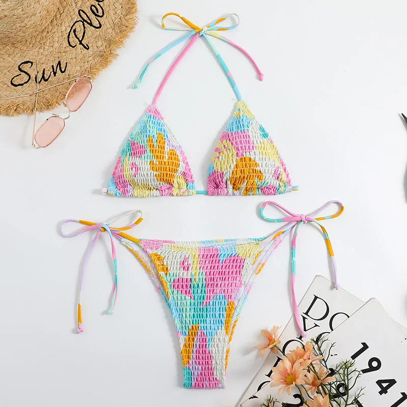 Multicolour floral printed women's triangle bikini with smocking craft details on the fabric.